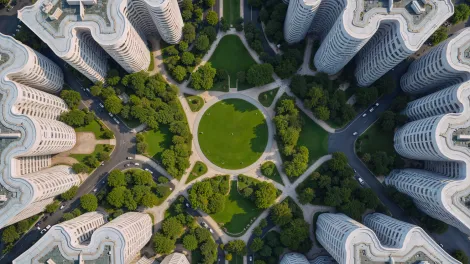 aerial-view-modern-urban-park-surrounded-by-residential-buildings-bd.png